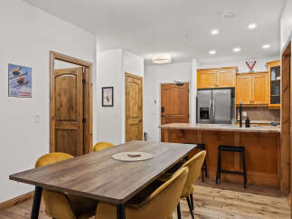 This stunning property boasts a modern kitchen with stainless steel appliances and ample cabinet space, perfect for culinary enthusiasts.