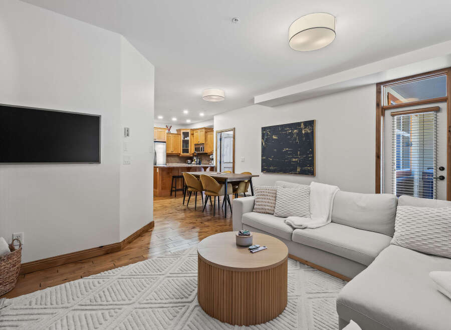 Step into modern elegance with this stunning living space.