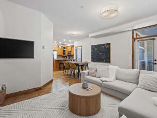 Step into modern elegance with this stunning living space.