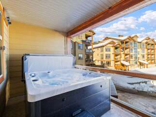Relax and unwind in this luxurious hot tub, perfectly situated on a private balcony with stunning views.