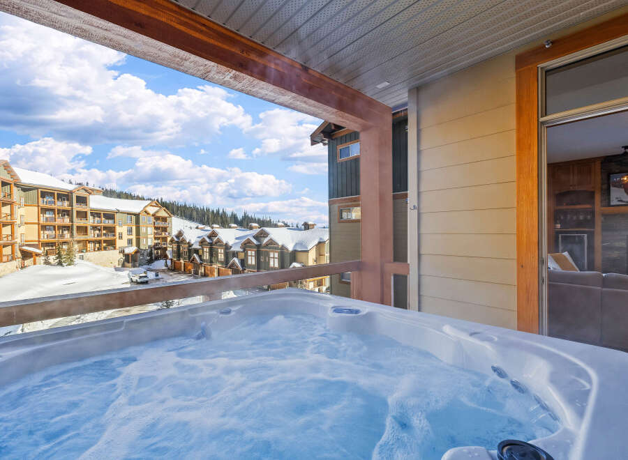 Enjoy the ultimate relaxation in this luxurious property featuring a private hot tub with stunning mountain views.