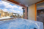 Enjoy the ultimate relaxation in this luxurious property featuring a private hot tub with stunning mountain views.
