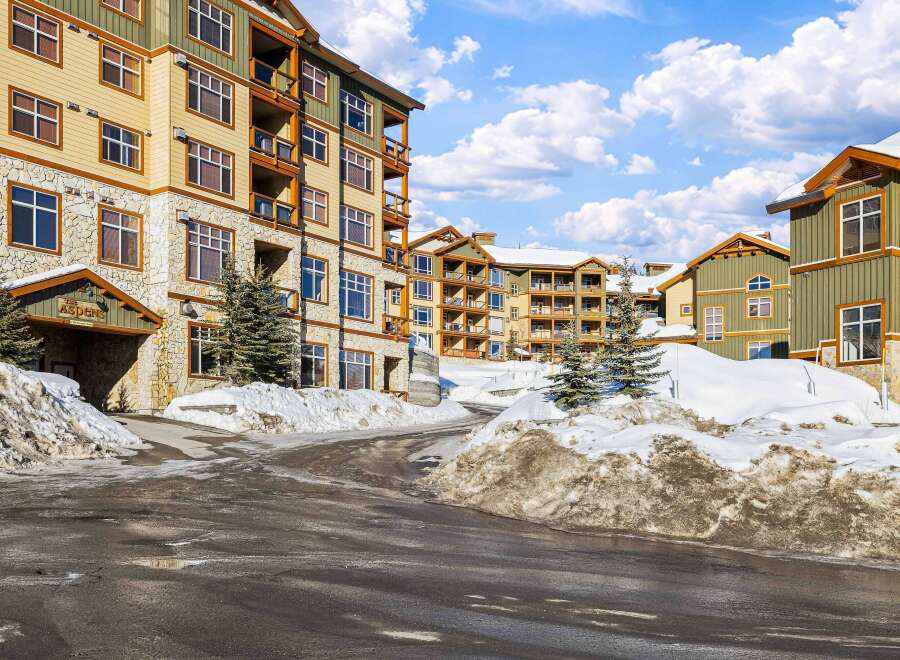 Discover luxury living at The Aspens, a stunning property nestled in a winter wonderland.