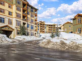 Discover luxury living at The Aspens, a stunning property nestled in a winter wonderland.