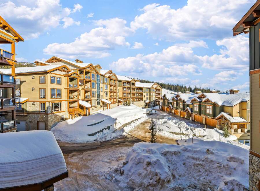 Discover luxury living in this stunning mountain property, featuring spacious units with balconies and breathtaking views.