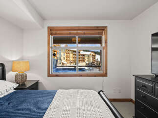 This stunning bedroom offers a luxurious retreat with breathtaking views.