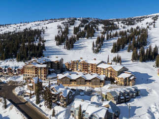 Discover the ultimate ski-in/ski-out luxury at this stunning mountain property.
