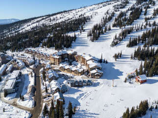 Experience the ultimate winter getaway in this stunning ski resort property! Nestled amidst snow-covered slopes and towering evergreens, this property offers unparalleled access to world-class skiing and snowboarding.