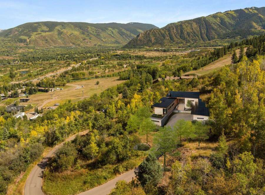 Nestled in a picturesque mountain landscape, this stunning property offers unparalleled views and luxurious living.