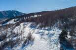 Explore the beauty of this stunning mountain property, perfect for those seeking a winter wonderland escape.