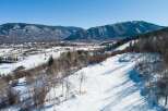 Experience the beauty of winter in this stunning mountain property.