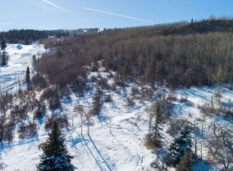 Explore the beauty of this stunning property nestled in a winter wonderland.