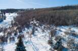 Explore the beauty of this stunning property nestled in a winter wonderland.
