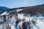 Discover the beauty of this stunning mountain property, perfect for those seeking a winter wonderland escape.