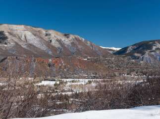 Nestled amidst the majestic mountains, this property offers breathtaking views and a serene atmosphere.