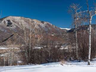 Nestled in a picturesque mountain landscape, this property offers stunning views and a serene atmosphere.