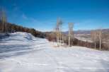 Explore this stunning winter landscape, perfect for building your dream home.