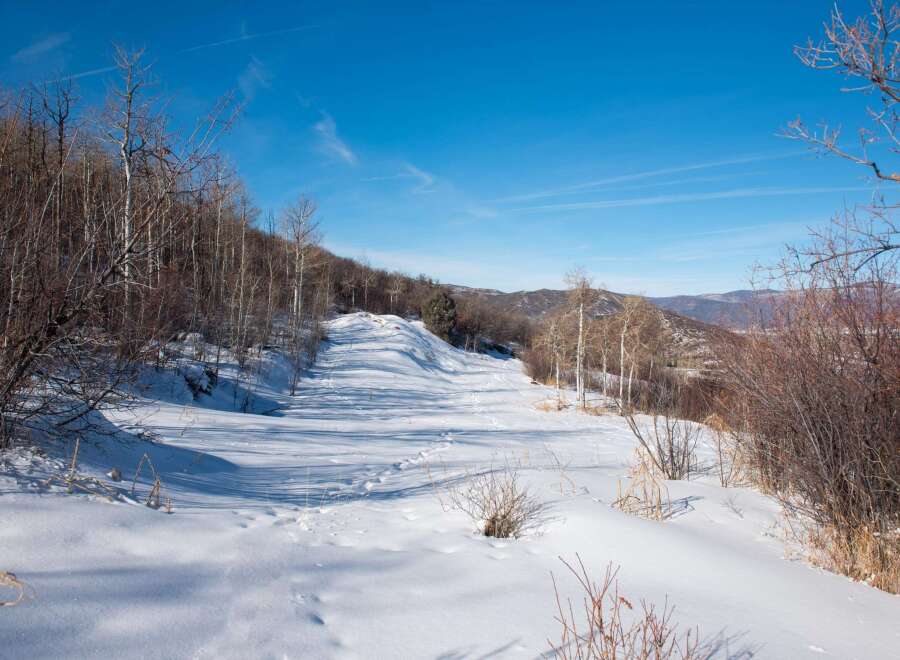 Explore the serene beauty of this winter wonderland, perfect for outdoor enthusiasts.