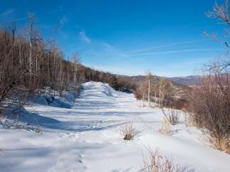 Explore the serene beauty of this winter wonderland, perfect for outdoor enthusiasts.