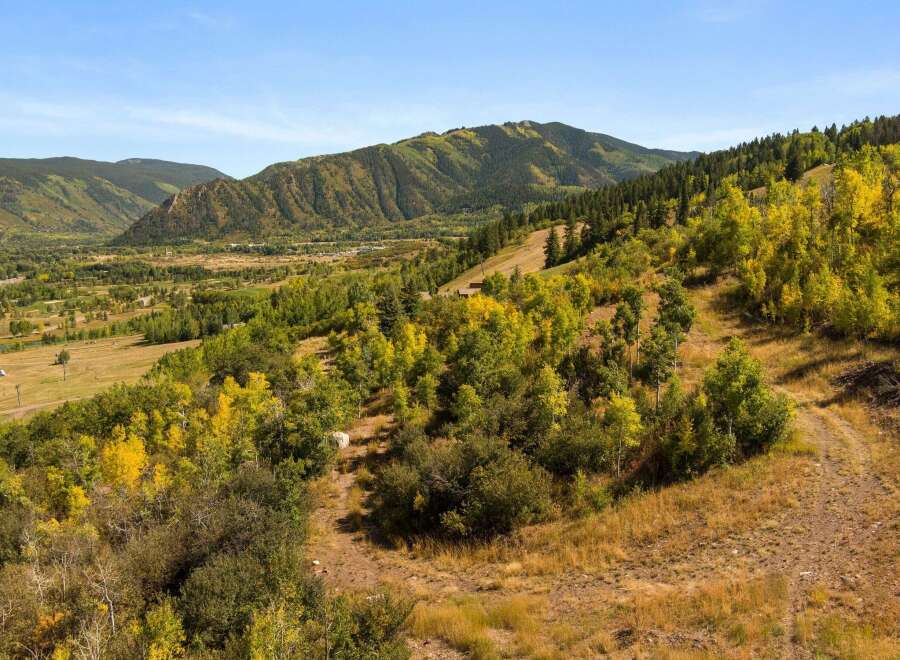 Discover the beauty of this stunning mountain property, offering breathtaking views and a serene natural setting.
