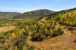Discover the beauty of this stunning mountain property, offering breathtaking views and a serene natural setting.