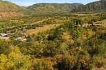 Nestled in a picturesque valley, this property offers stunning views of the surrounding mountains and lush greenery.