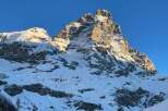 Explore the majestic beauty of this mountain landscape, perfect for those seeking a serene escape.