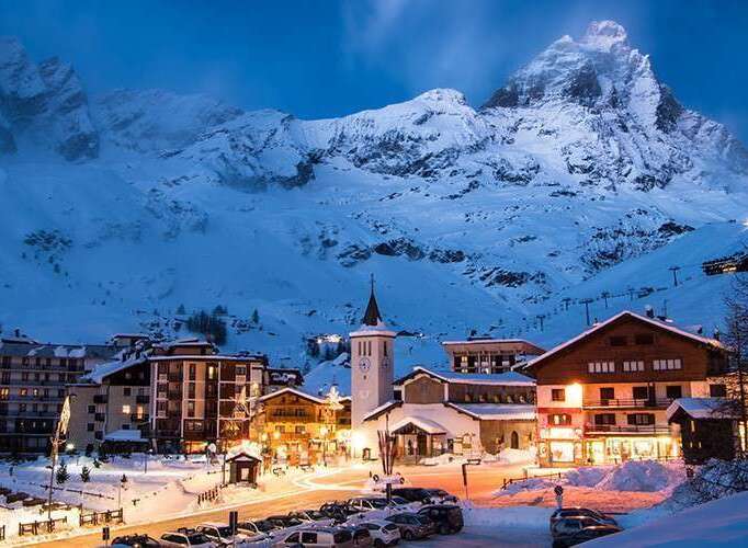 Experience the charm of a winter wonderland with this stunning property nestled in the heart of the mountains.