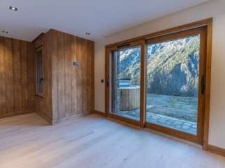Experience the epitome of luxury living in this stunning property, showcasing a harmonious blend of natural elements and modern design.