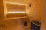 Step into relaxation with this stunning sauna.