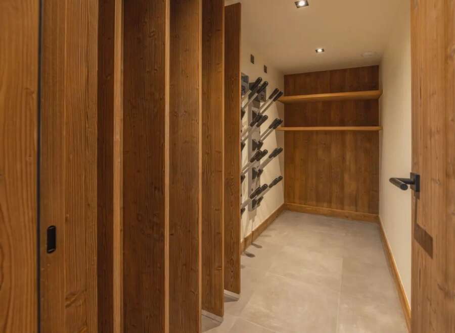 Step into luxury with this stunning wine cellar, designed to impress.
