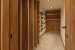 Step into luxury with this stunning wine cellar, designed to impress.