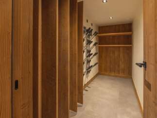 Step into luxury with this stunning wine cellar, designed to impress.