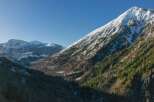 Explore the breathtaking beauty of this mountain landscape, perfect for those seeking a serene escape.