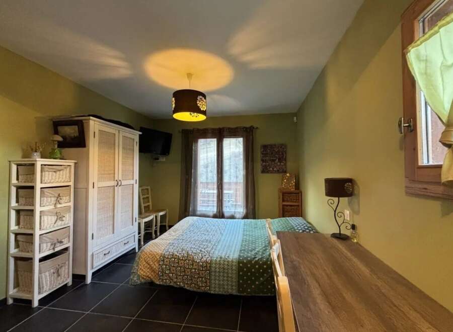 Discover the charm of this cozy bedroom, perfect for a relaxing retreat.