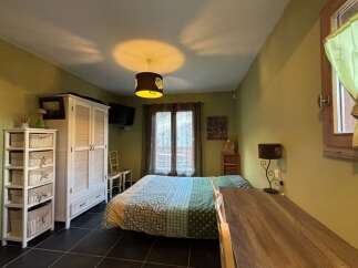 Discover the charm of this cozy bedroom, perfect for a relaxing retreat.