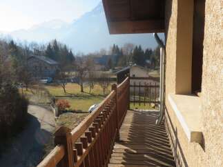 Enjoy breathtaking mountain views from this charming property.