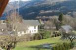 Enjoy breathtaking mountain views from this charming property.