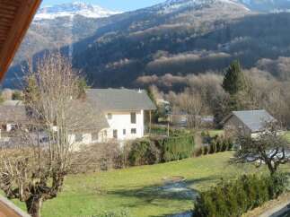 Enjoy breathtaking mountain views from this charming property.