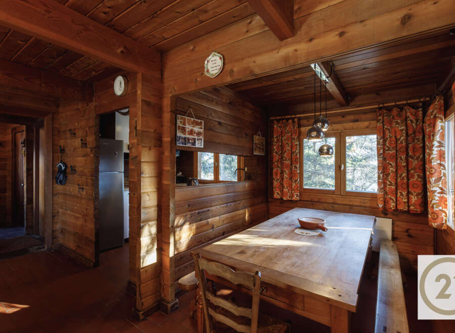 Step into a cozy, rustic retreat with this charming property.