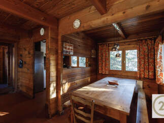Step into a cozy, rustic retreat with this charming property.