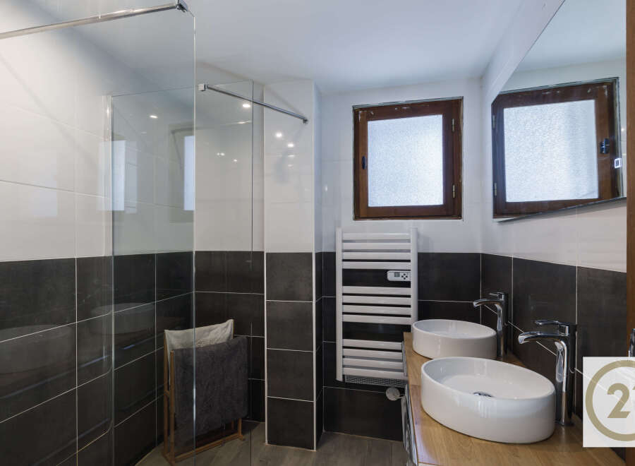 Step into modern luxury with this stunning bathroom.