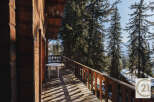 Enjoy breathtaking mountain views from this charming balcony.