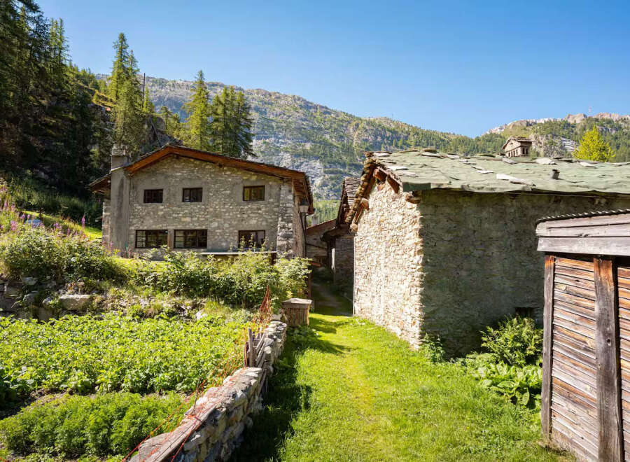 Discover this charming stone house nestled in a serene mountain village, offering a unique blend of rustic charm and natural beauty.