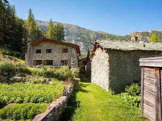 Discover this charming stone house nestled in a serene mountain village, offering a unique blend of rustic charm and natural beauty.