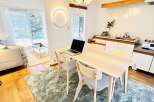 This stunning property features a modern dining area, perfect for both everyday meals and entertaining guests.
