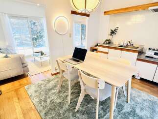 This stunning property features a modern dining area, perfect for both everyday meals and entertaining guests.