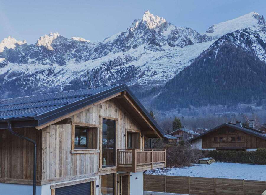 Experience the epitome of alpine living in this stunning chalet, perfectly nestled against a backdrop of majestic snow-capped mountains.