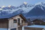 Experience the epitome of alpine living in this stunning chalet, perfectly nestled against a backdrop of majestic snow-capped mountains.