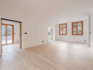 Discover this stunning, light-filled property featuring beautiful wooden floors and large windows that offer breathtaking views.